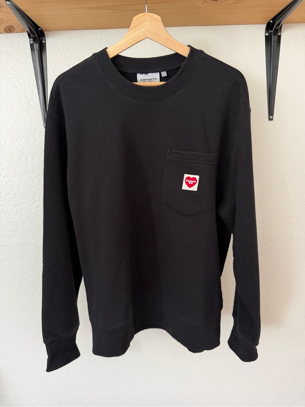 Carhartt WIP Black Crewneck Sweater with Red Heart Pocket Patch